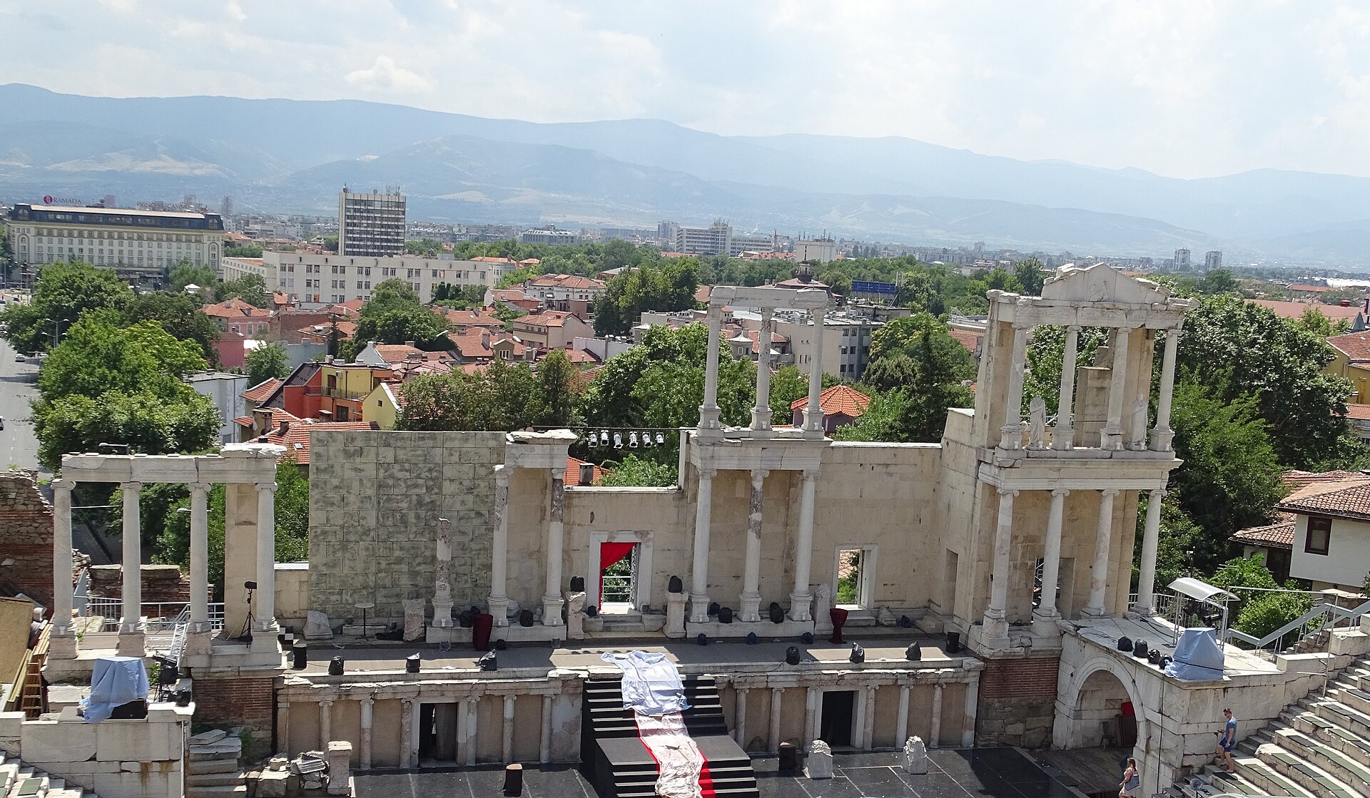 The Roman theatre of Plovdiv with the city and mountains behind